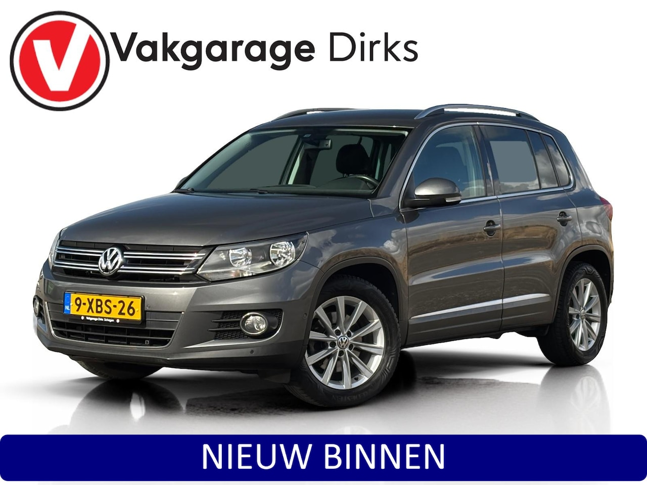 Volkswagen Tiguan - 1.4 TSI Aut. Sport&Style ✅ Navi ✅ Cruise ✅ Trekhaak - AutoWereld.nl