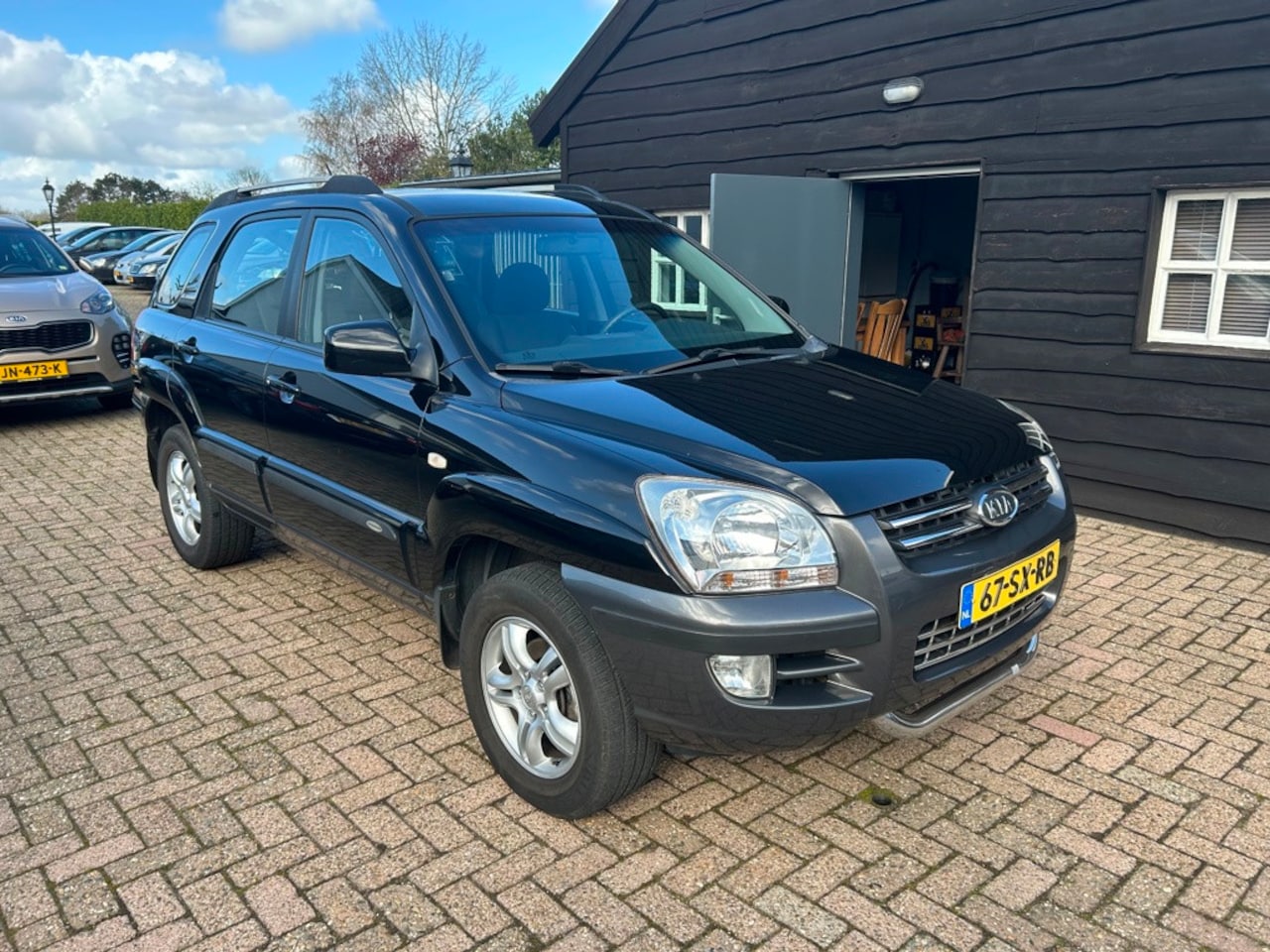 Kia Sportage - 2.0 CVVT Comfort 2.0 CVVT Comfort - AutoWereld.nl