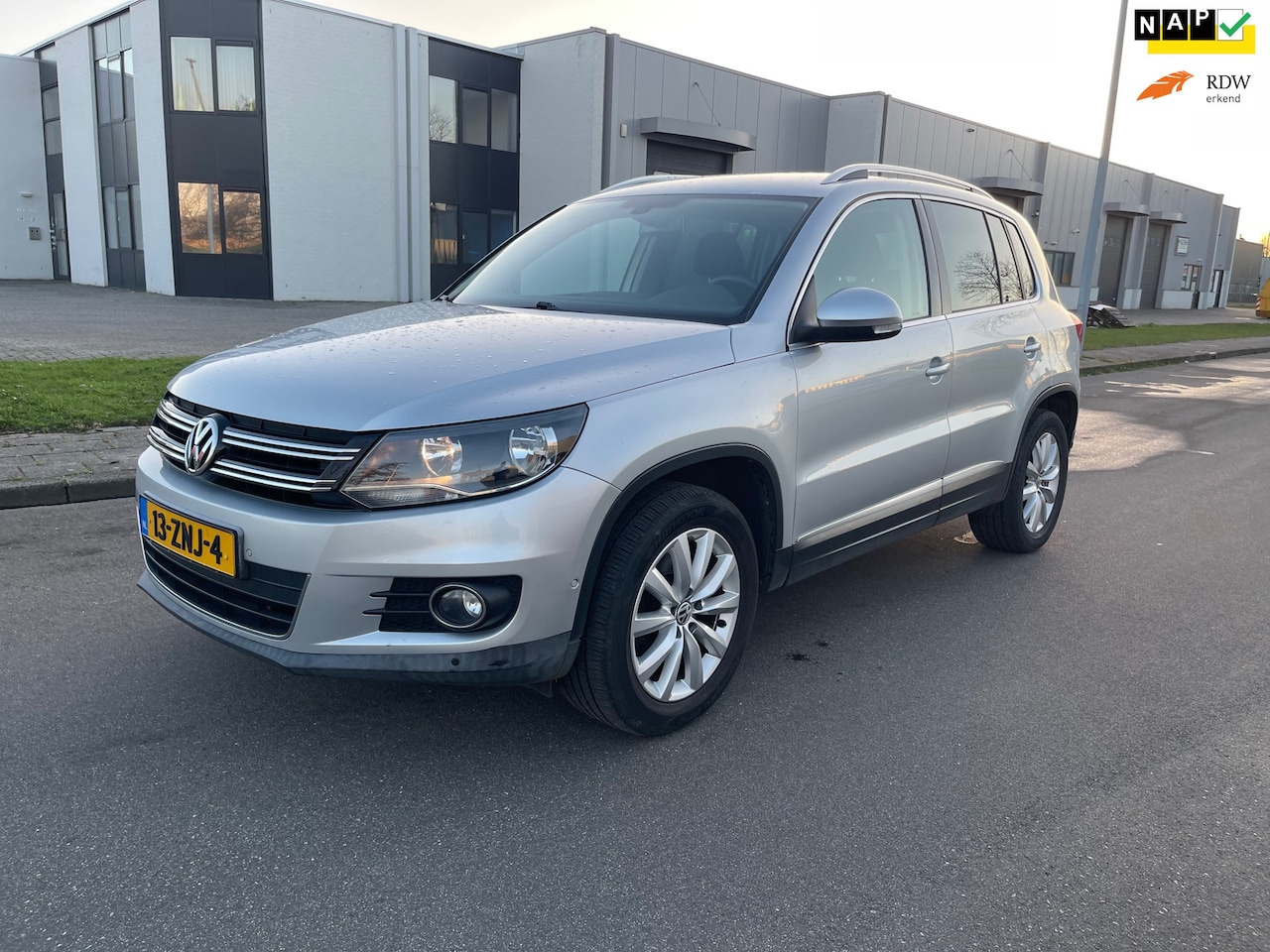 Volkswagen Tiguan - 1.4 TSI Sport&Style - AutoWereld.nl