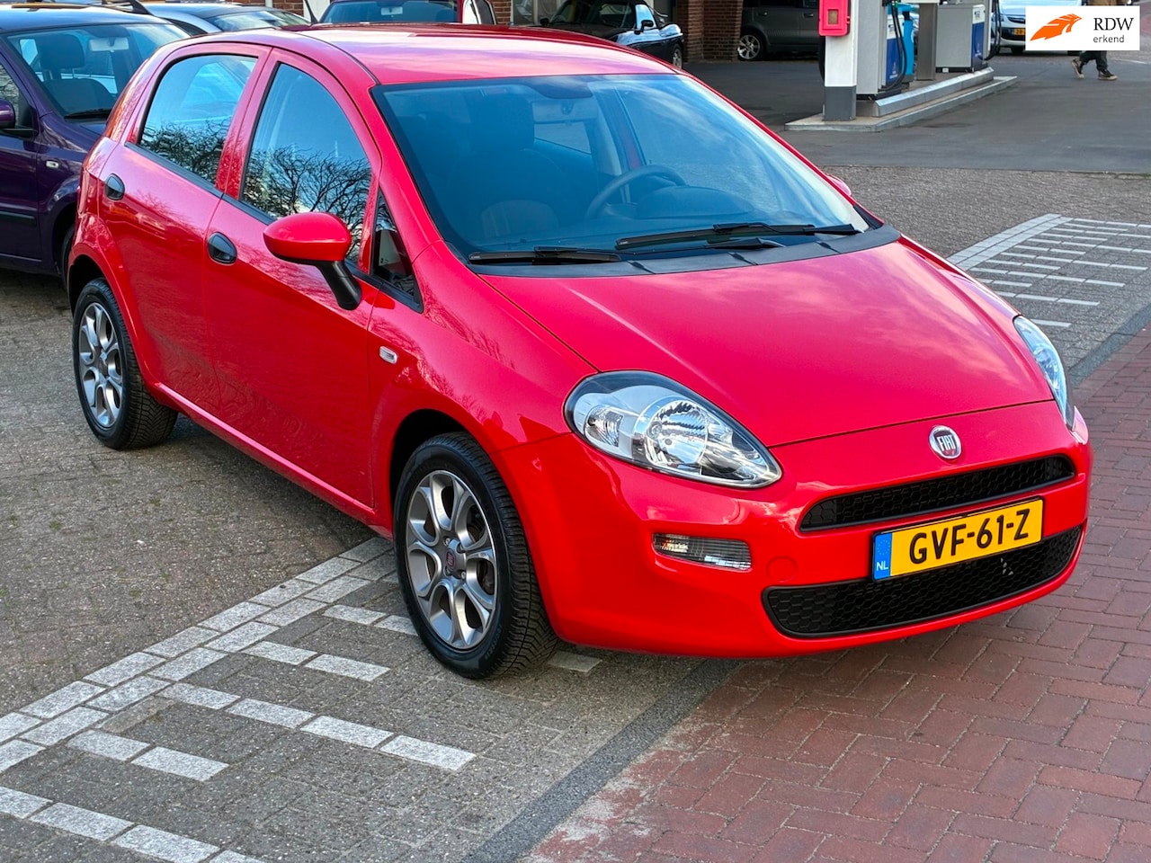 Fiat Punto Evo - 1.2 /4CILINDER / SLECHTS 60.000KM/ LM VELGEN/4 DEURS - AutoWereld.nl