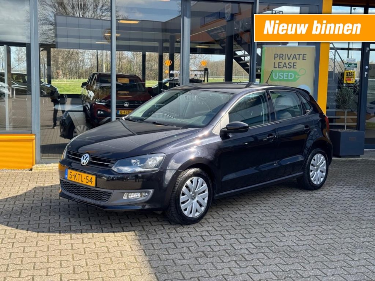 Volkswagen Polo - 1.4-16V Highline - all season - trekhaak - AutoWereld.nl