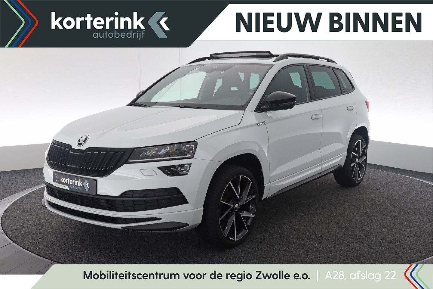 Skoda Karoq - 1.5 TSI ACT Sportline Business | Pano | Winterpakket | CANTON - AutoWereld.nl