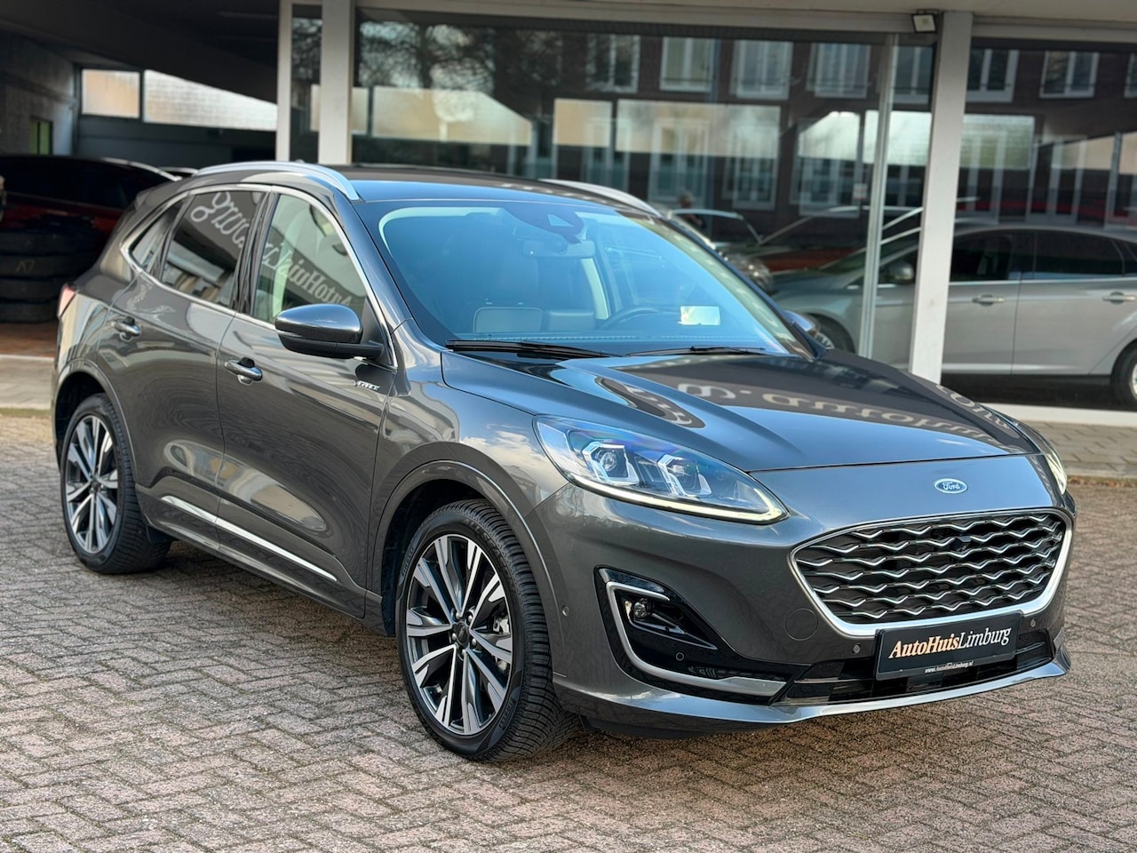 Ford Kuga - 2.5 PHEV Vignale|Leer|Camera|HUD|NW All Season|1e Eigenaar - AutoWereld.nl