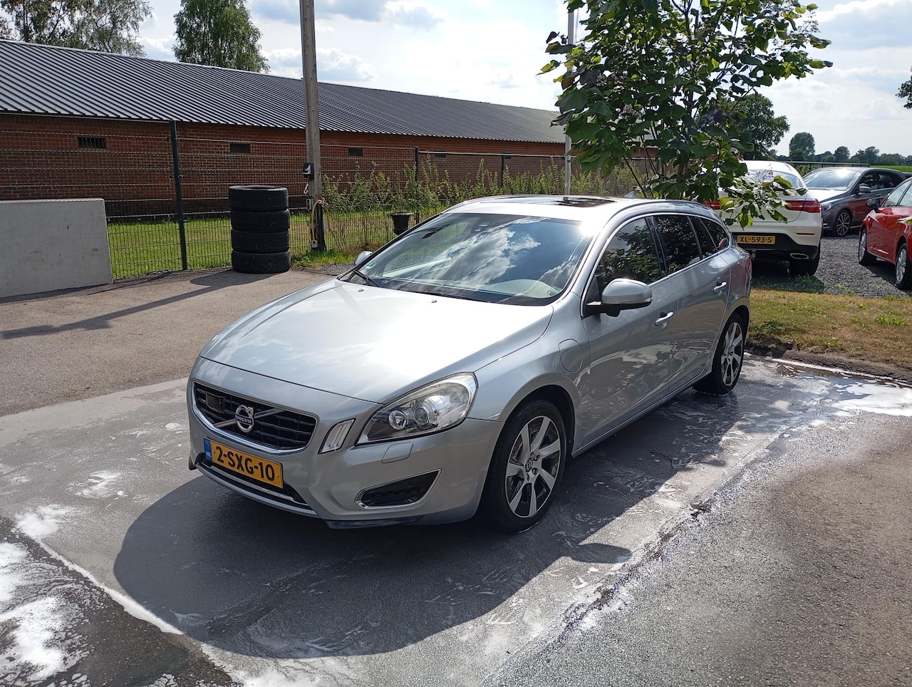 Volvo V60 - 2.4 D6 AWD Plug-In Hybrid Pure Limited - AutoWereld.nl