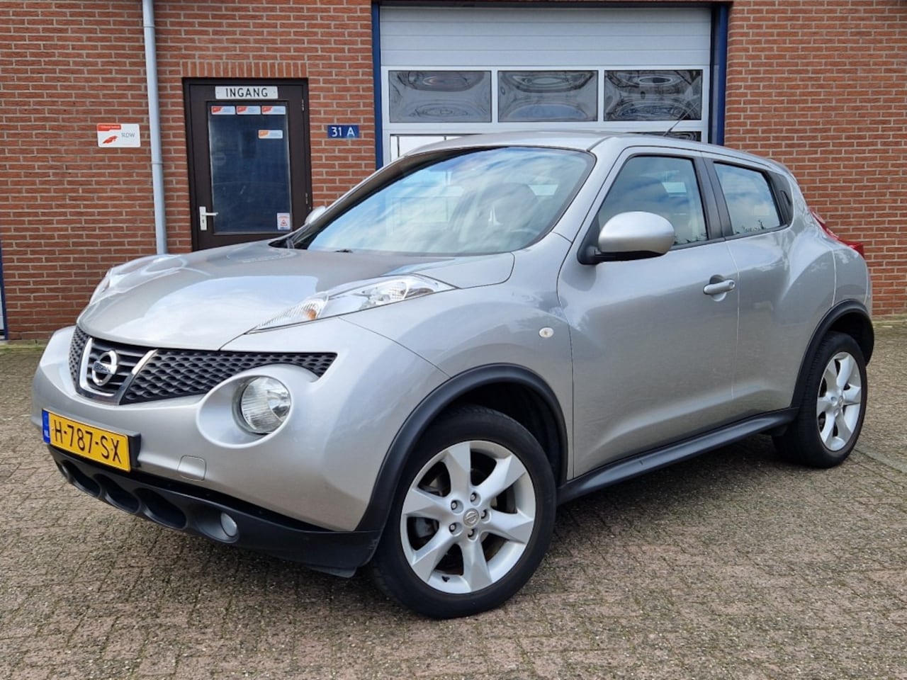 Nissan Juke - 1.6i Acenta Navi Climate control Cruise control - AutoWereld.nl