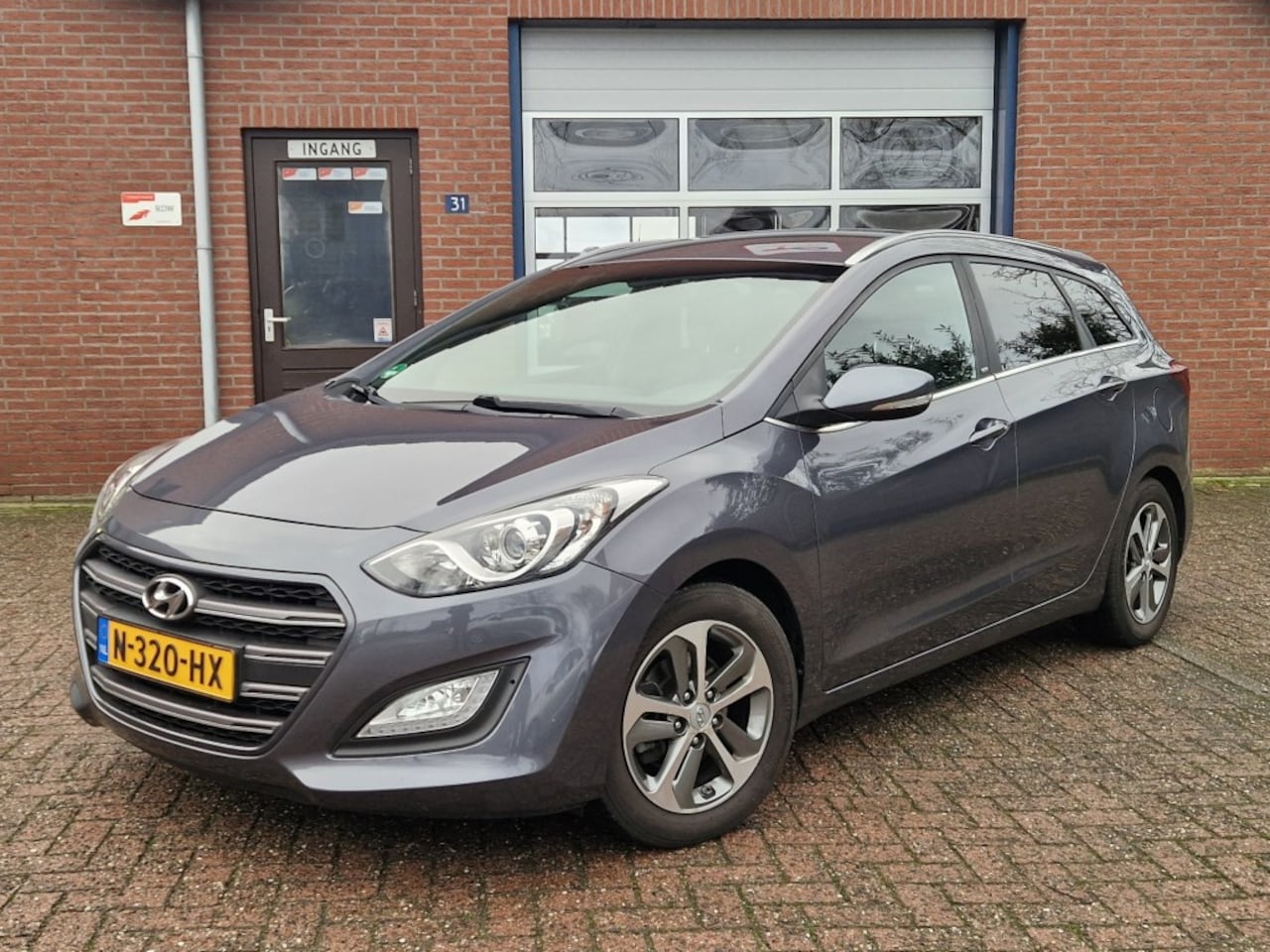 Hyundai i30 Wagon - Wagon 1.4 i-Drive Navigatie Climate Cruise Trekhaak Camera Privacyglas - AutoWereld.nl