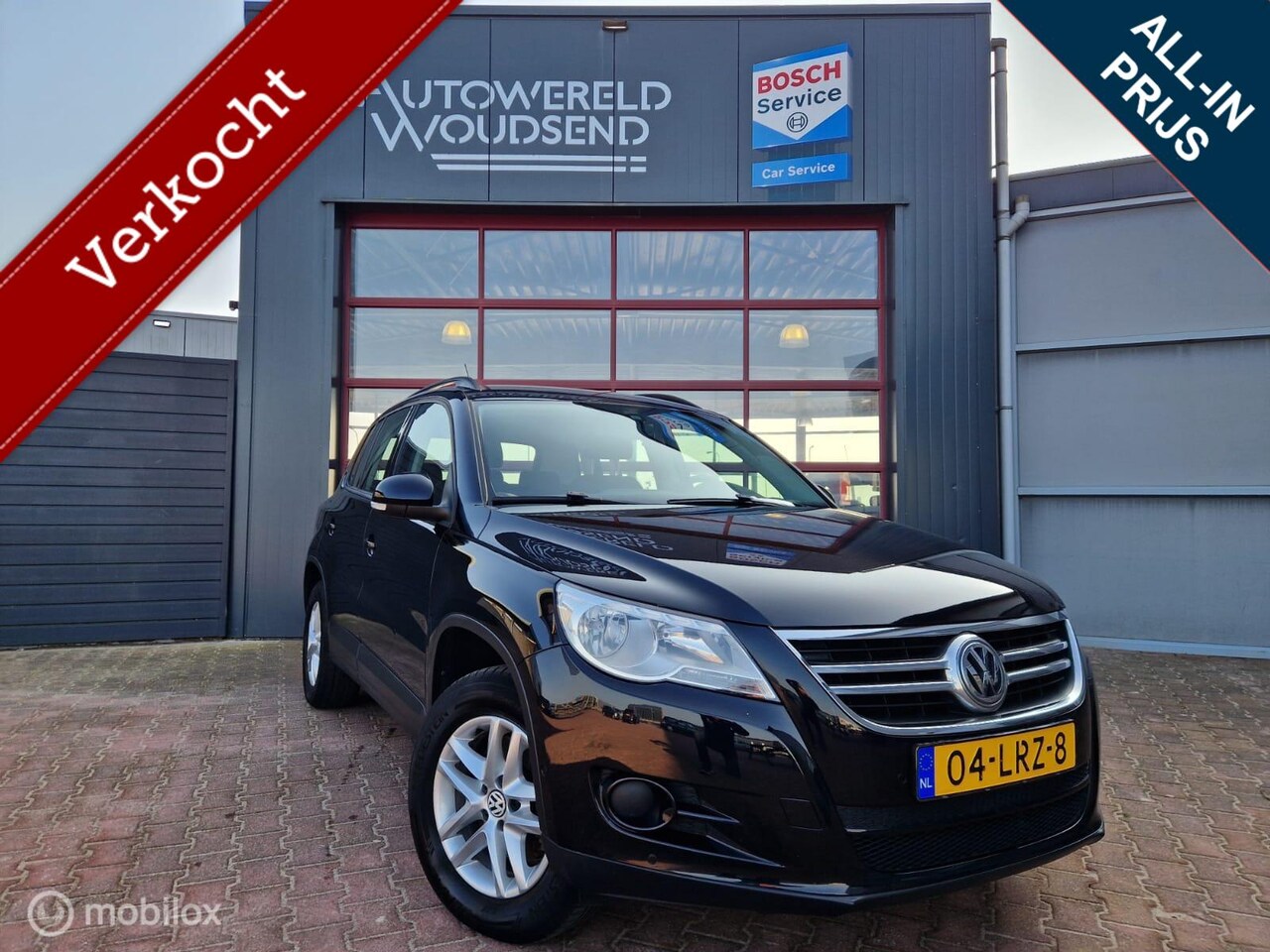 Volkswagen Tiguan - 1.4 TSI Sport&Style 6MND BOVAG GAR | NAVI |ECC | TREKHAAK | PDC V+A | CAMERA - AutoWereld.nl