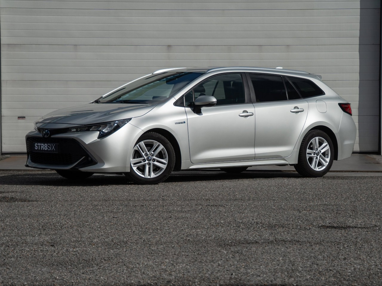 Toyota Corolla Touring Sports - 1.8 Hybrid Active (2020) | AUT | Navi | CarPlay | LED | Stoelverwarming - AutoWereld.nl