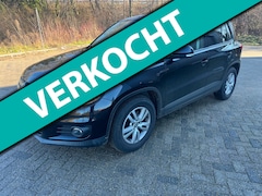 Volkswagen Tiguan - 2.0 TDI stoelV cruiseC ClimaT Navi