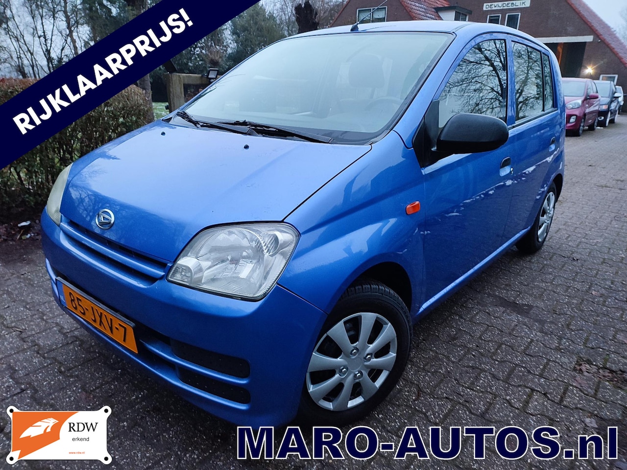 Daihatsu Cuore - 1.0-12V 5d. Anniversary | NW. DISTR.+KOPPELING! 5-DEURS! Boekjes! 2009| RIJKLAAR! - AutoWereld.nl