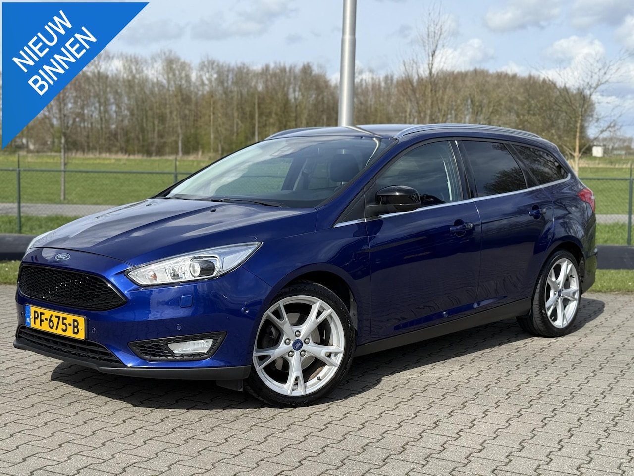 Ford Focus Wagon - 1.5 Titanium Edition |CRUISE|PDC|NAVI|STOEL.VERVARM|TOP STAAT ! - AutoWereld.nl