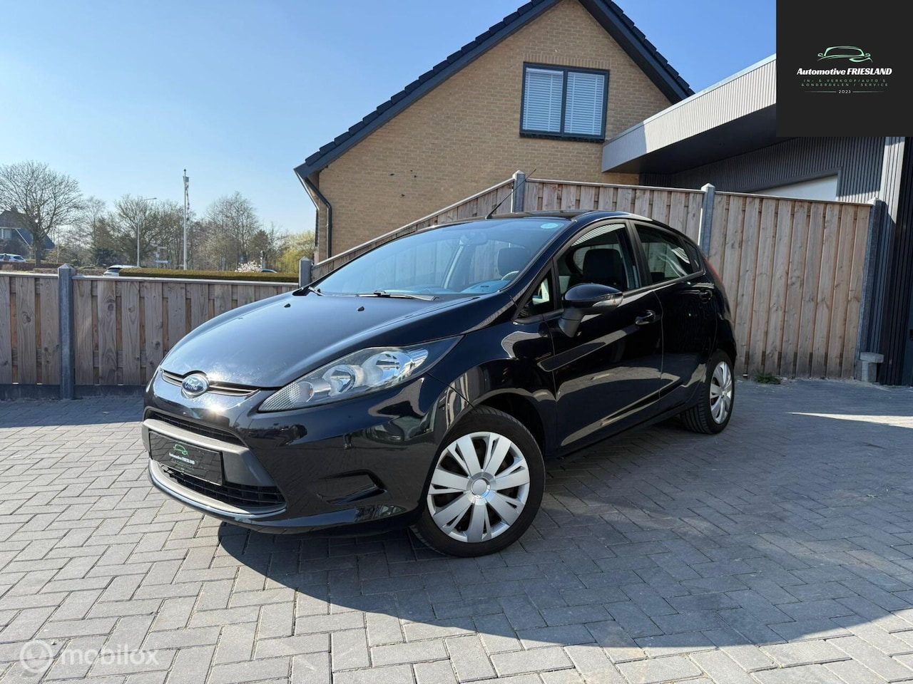 Ford Fiesta - 1.25 Ghia 1.25 Ghia - AutoWereld.nl
