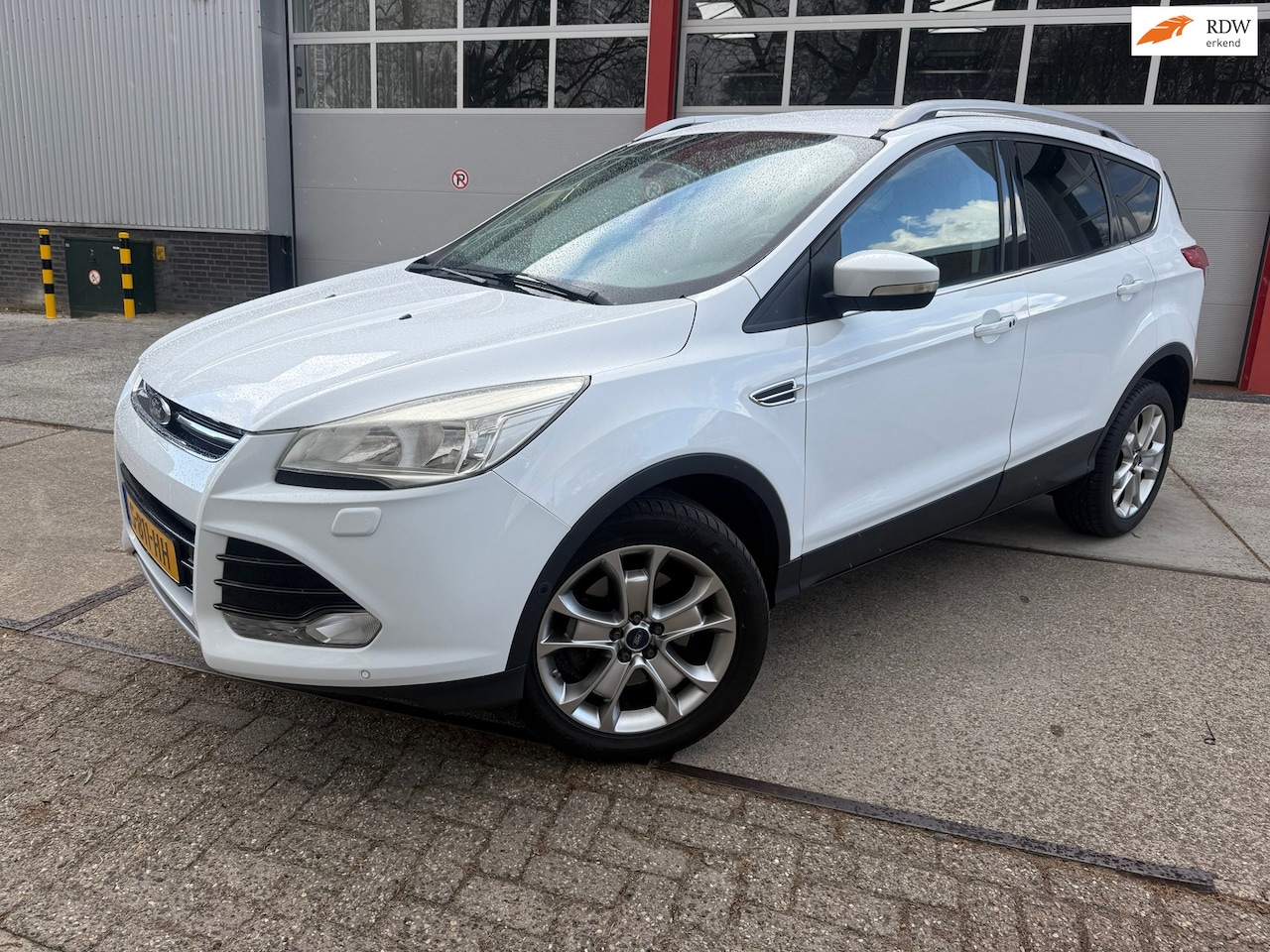 Ford Kuga - 1.6 Titanium 4WD AUT NAVI - AutoWereld.nl
