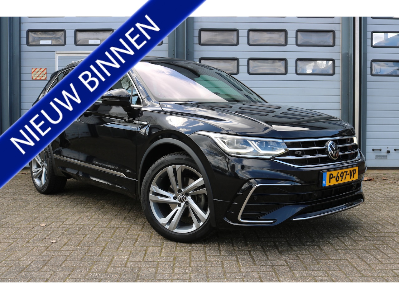 Volkswagen Tiguan - 1.5 TSI R-Line Business+ Panodak Virtual cockpit Xenon Navi T-haak Bj:2022 - AutoWereld.nl