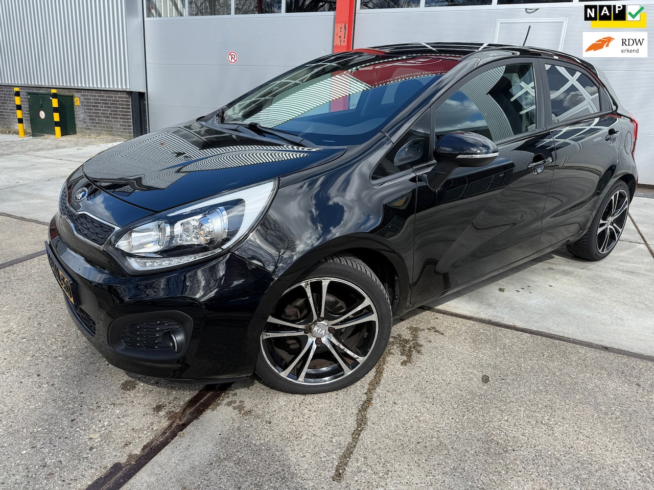 Kia Rio - 1.2 CVVT Super Pack Navi Achteruitrijcamera Keyless - AutoWereld.nl