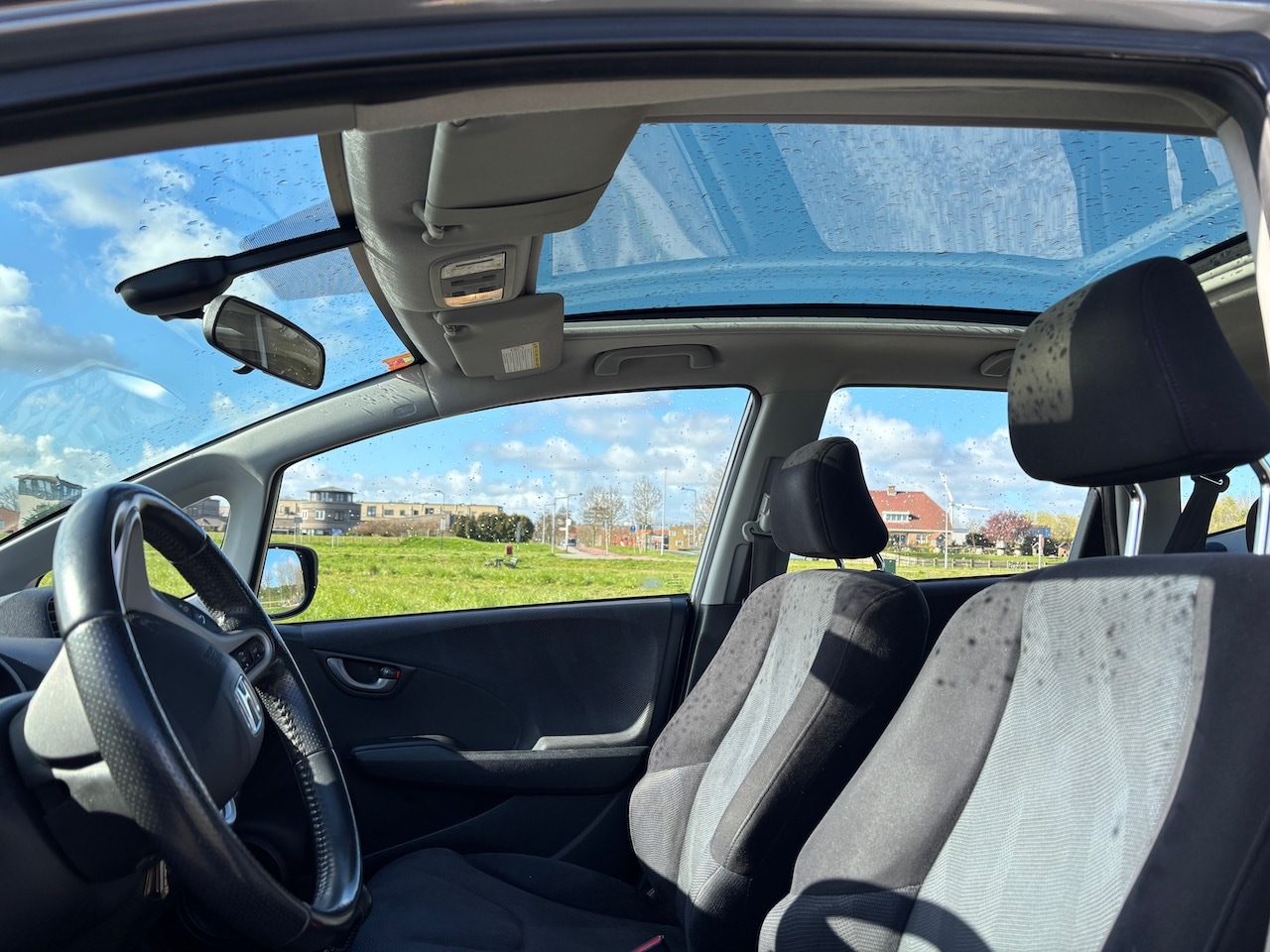 Honda Jazz - 1.4 Exclusive Lichtmetalen velgen 16" Panoramadak - AutoWereld.nl