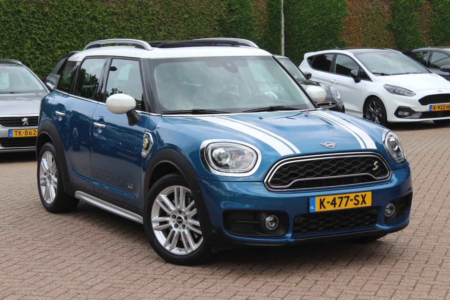 MINI Countryman - Mini 2.0 Cooper S E ALL4 Chili / Panoramadak / Camera / Head-up / Apple CarPlay / Navigati - AutoWereld.nl
