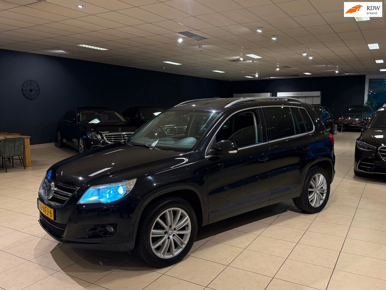 Volkswagen Tiguan - 2.0 TSI DSG|Sport&Style|4Motion|Pano|Leder|Vol - AutoWereld.nl