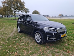 BMW X5 - 5.0i xDrive 7p. V8 twin turbo & 7 persoons 450 PK standkachel & Luchtvering