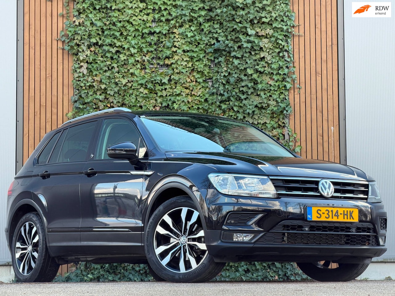 Volkswagen Tiguan - 1.4 TSI ACT Highline|stoel verwarm.|2 zones clima - AutoWereld.nl