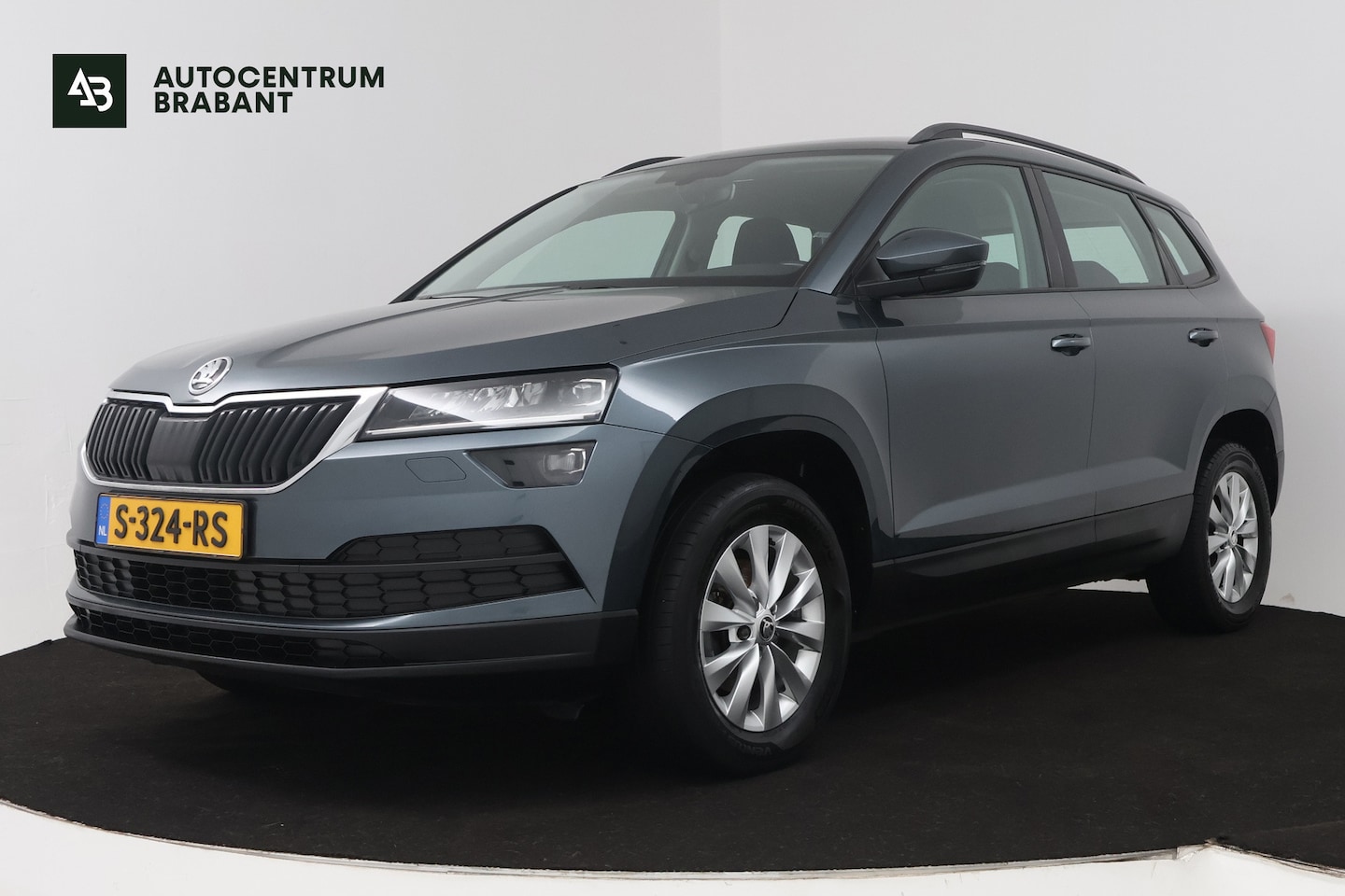 Skoda Karoq - 1.0 TSI Clever Edition (NAVIGATIE, STOELVERWARMING, PARKEERSENSOREN, CARPLAY) - AutoWereld.nl