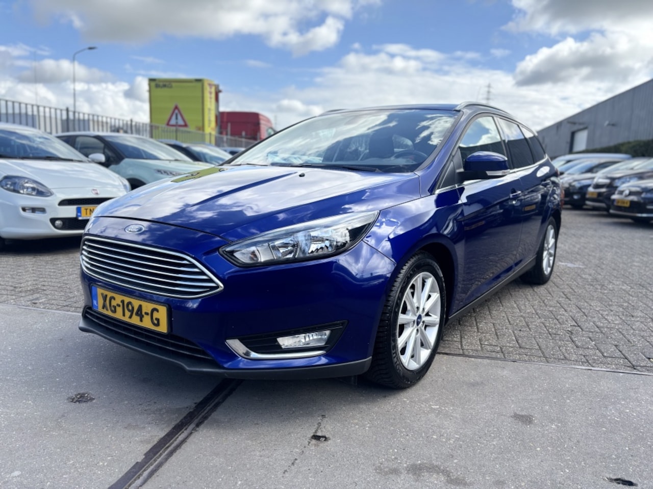 Ford Focus Wagon - 1.0 Titanium CLIMA!NAVI! - AutoWereld.nl