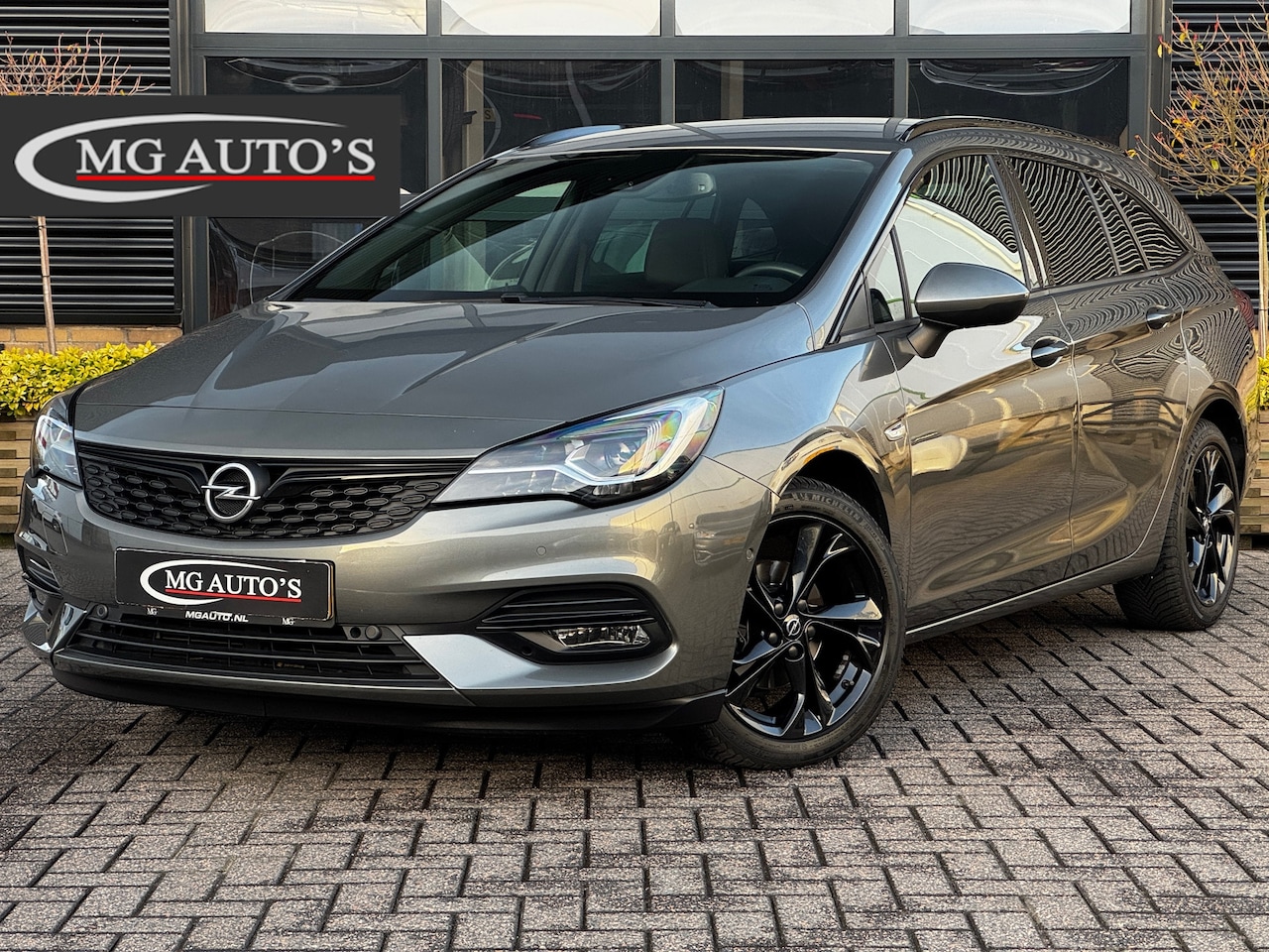 Opel Astra Sports Tourer - 1.4 Ultimate |Trekhaak | Navigatie | Adaptive Cruise Control | Achteruitrijcamera | Parkee - AutoWereld.nl