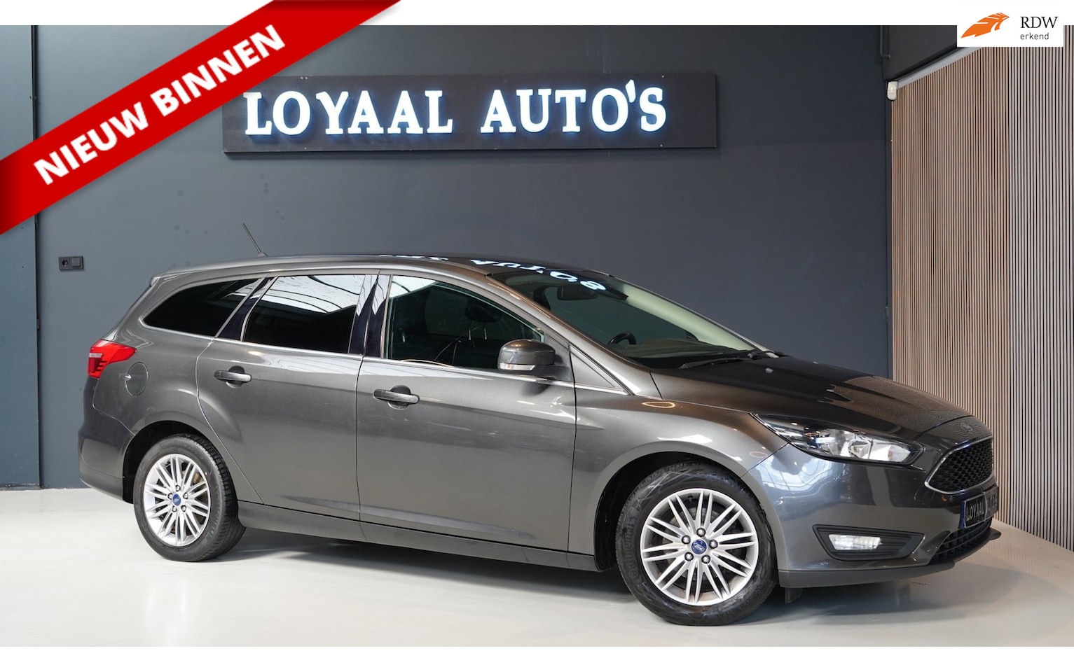 Ford Focus Wagon - 1.0 Titanium | NAVI | AIRCO | CRUISE | TREKHAAK | PDC | APK. - AutoWereld.nl