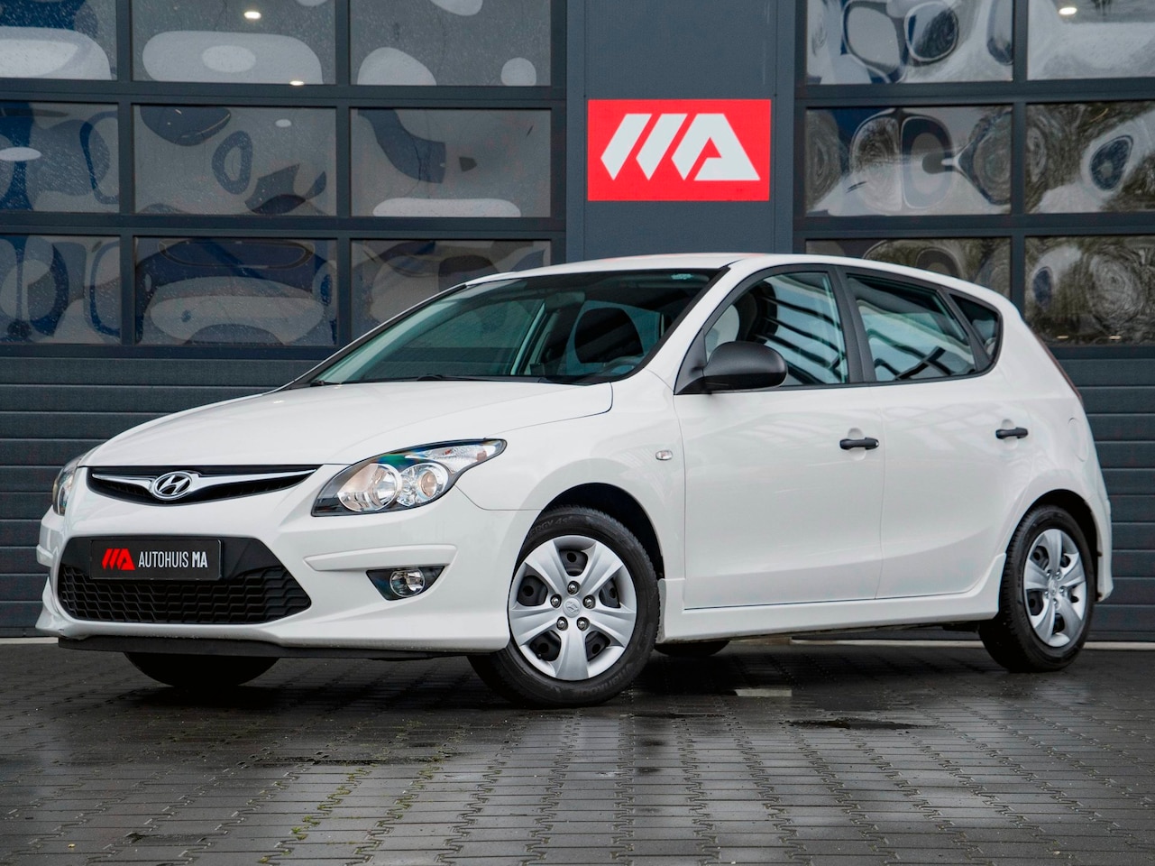 Hyundai i30 - 1.4i i-Drive Airco|Radio|AUX|Elektrische ramen|Carkit|Bluetooth - AutoWereld.nl