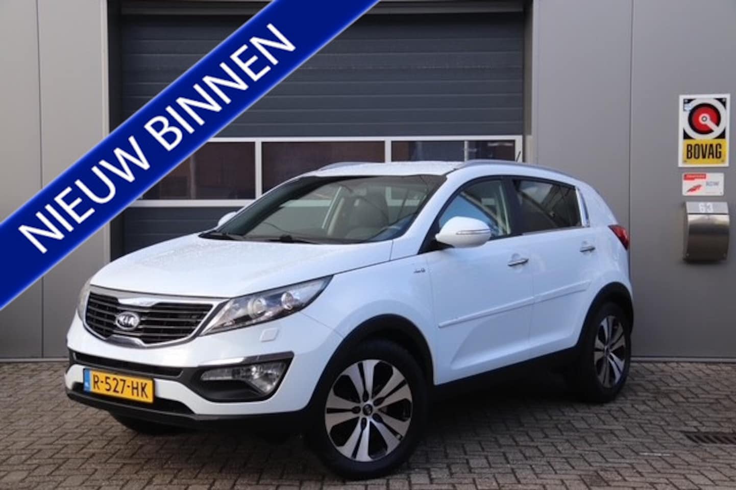 Kia Sportage - 2.0 X-clusive 4wd 2.0 X-clusive 4wd, Automaat, Stoelverwarming Voor&Achter, Camera, Cruise, Navi - AutoWereld.nl