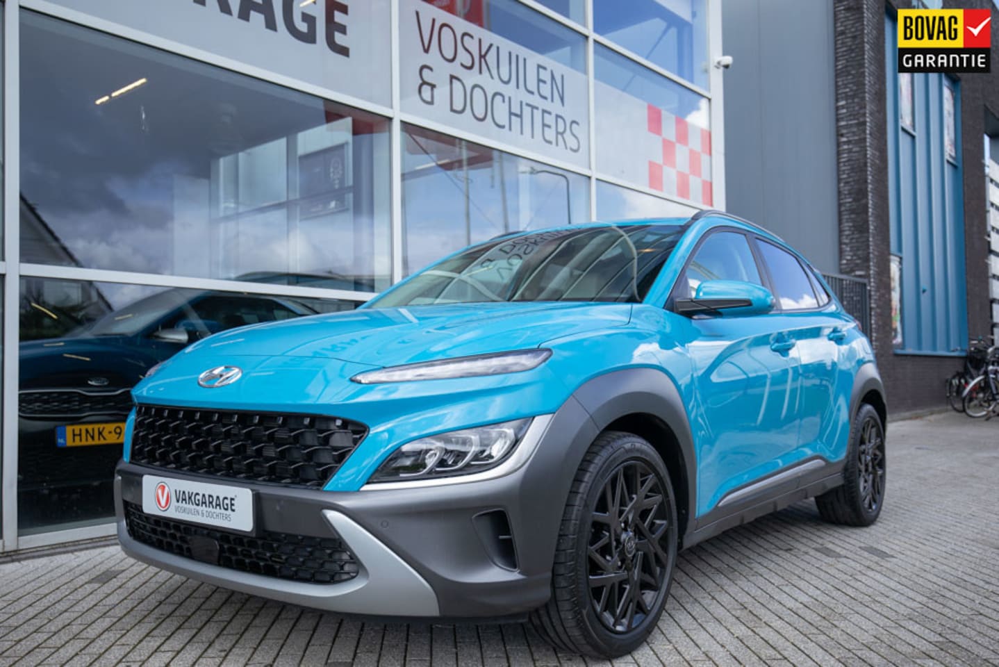Hyundai Kona - 1.6 GDI HEV Premium Sky | Leder | Open dak - AutoWereld.nl
