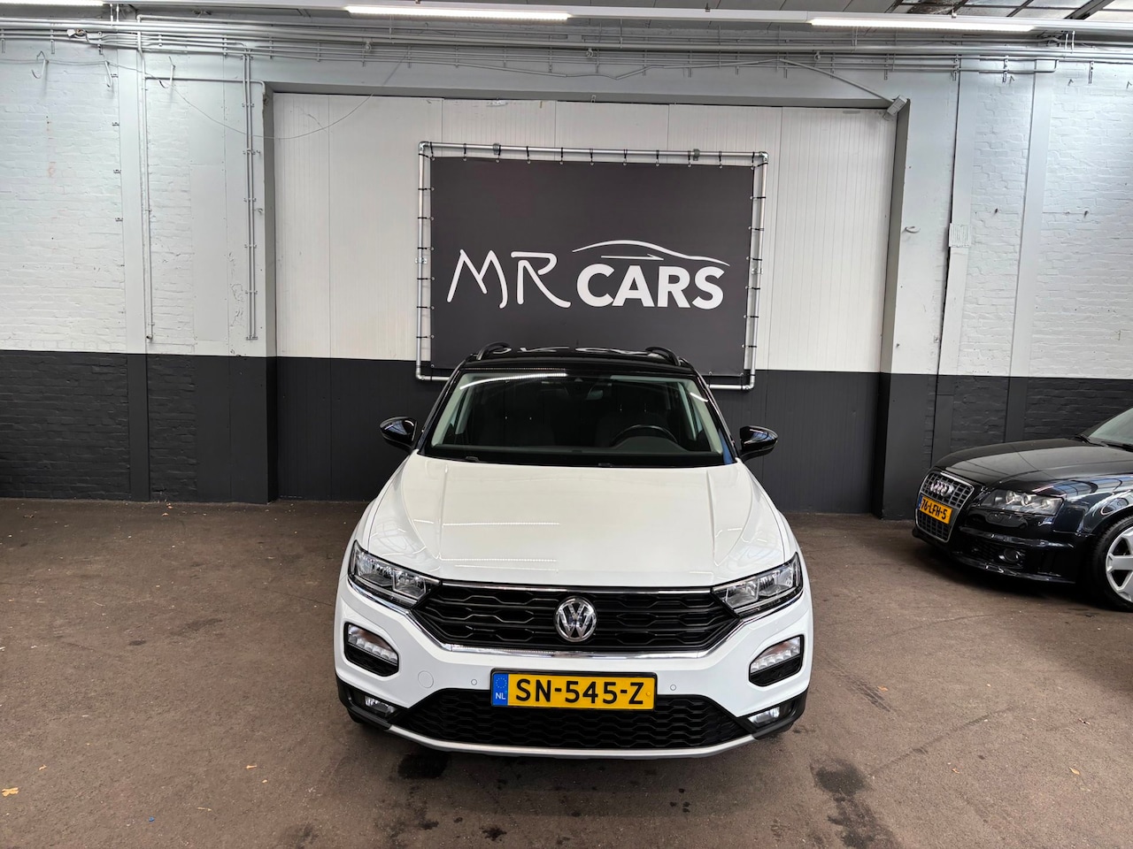 Volkswagen T-Roc - 1.0 TSI Style Airco/Navi/Cruise Control - AutoWereld.nl