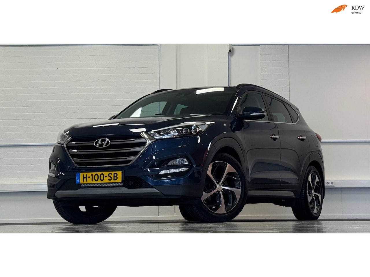 Hyundai Tucson - 1.6 T-GDi Premium 4WD Schuif/kanteldak Leer Navi LED Mooi! - AutoWereld.nl