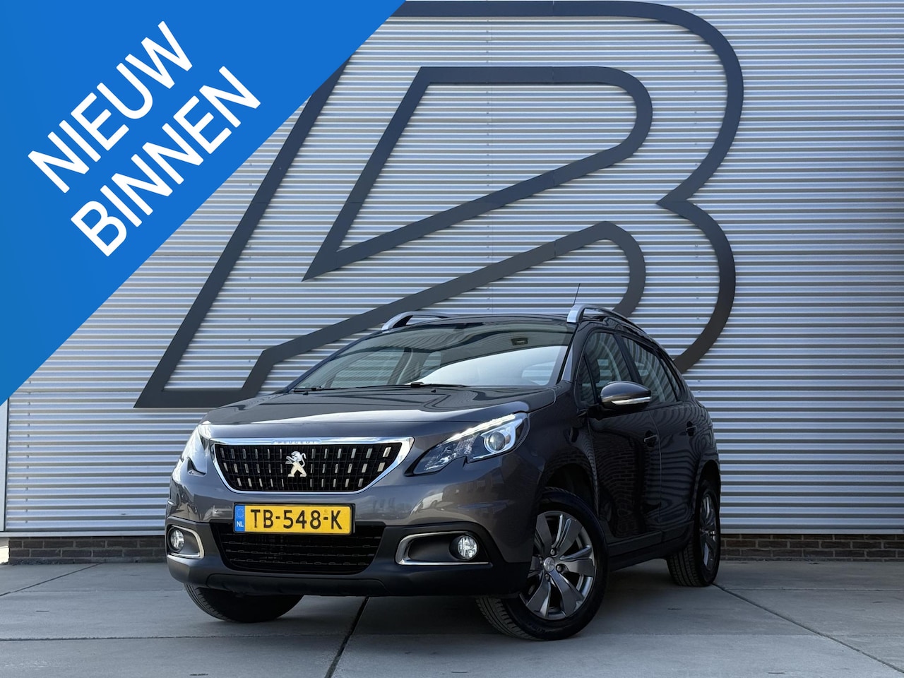 Peugeot 2008 - 1.2 PureTech Blue Lion Navi|Trekhaak|D-riem v.v. in 2023|Carplay|Cruise|PDC|N.A.P|APK tot - AutoWereld.nl