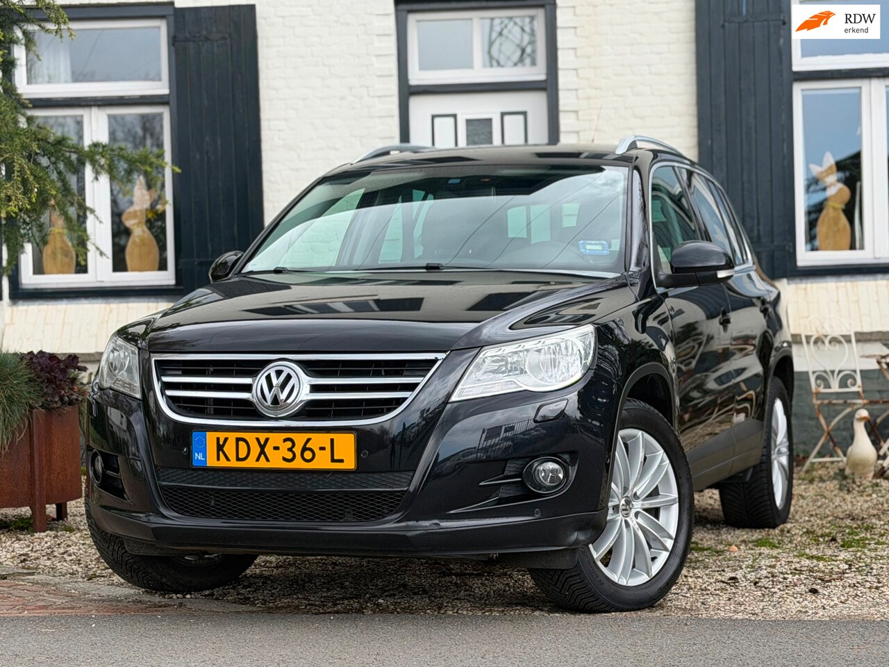 Volkswagen Tiguan - 1.4 TSI Sport&Style|Stoelverwarming|Trekhaak|PDC| - AutoWereld.nl