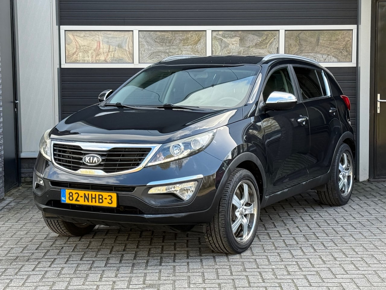 Kia Sportage - 2.0 X-ecutive Plus Pack Trekhaak, Navi, Cruise, Climate, NAP - AutoWereld.nl