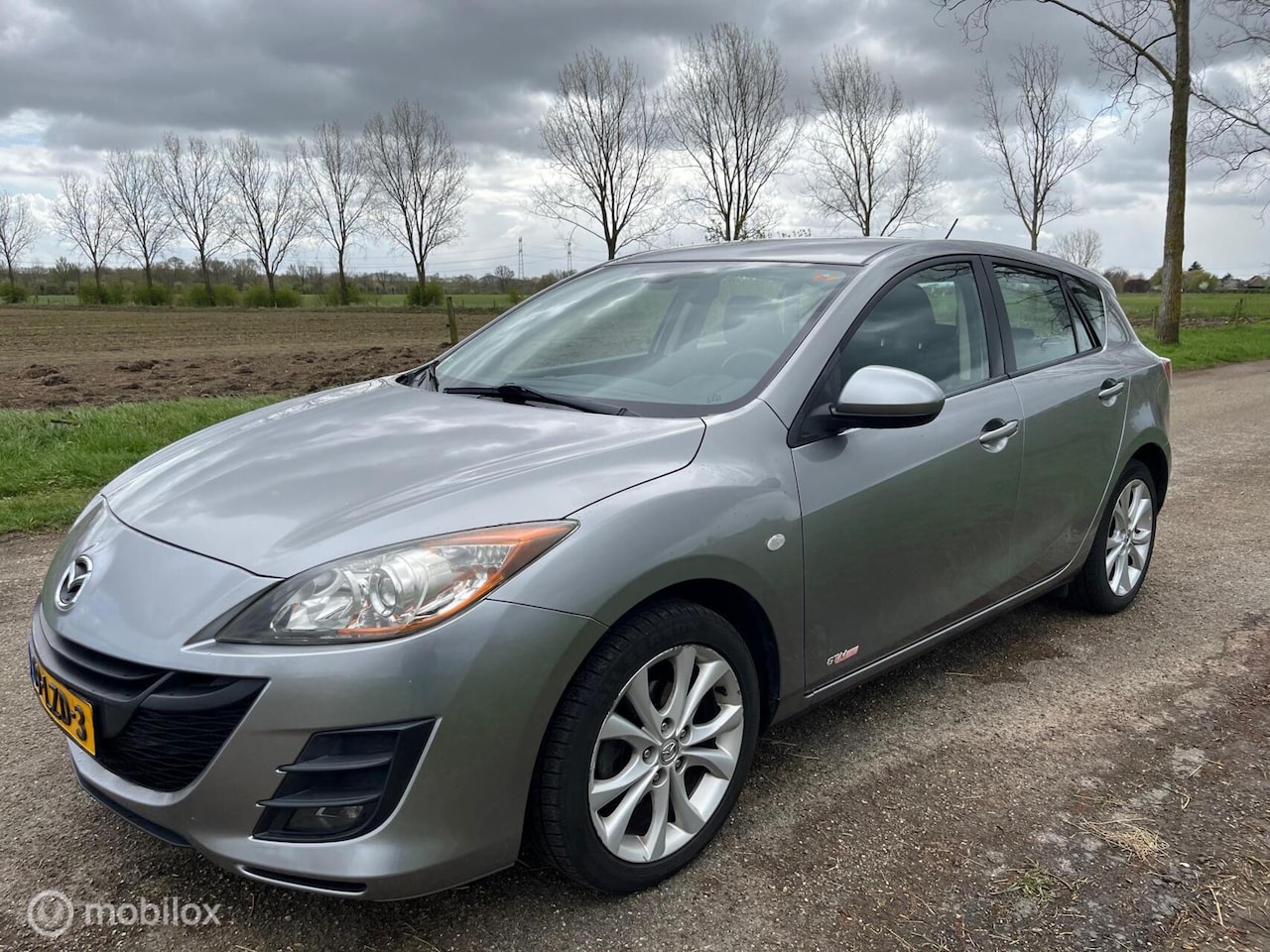 Mazda 3 - 1.6 GT-M Line / Climate / Cruise / Pdc / (bj 2010) - AutoWereld.nl