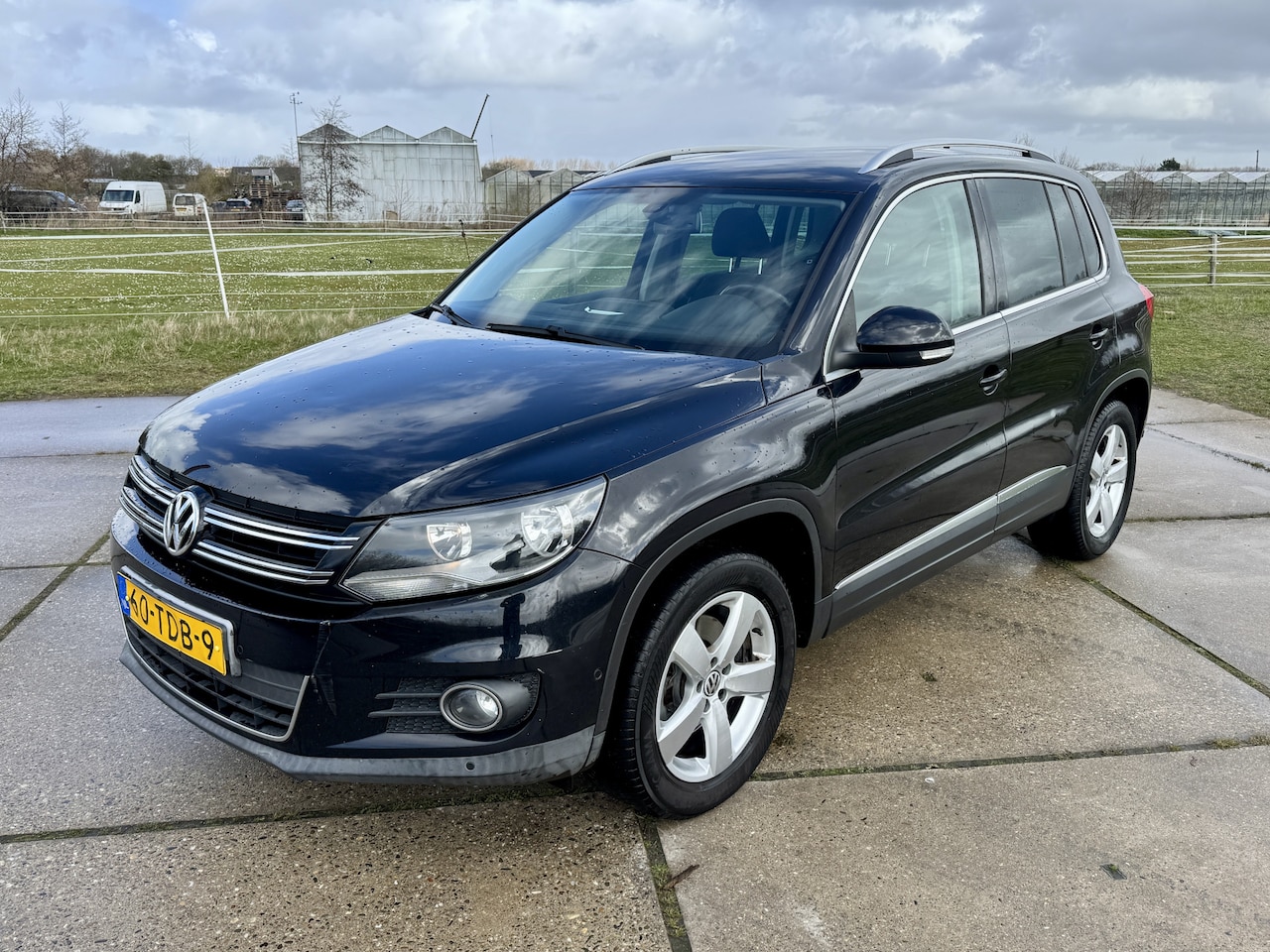 Volkswagen Tiguan - 1.4 TSI 160pk clima navigatie lm velgen - AutoWereld.nl