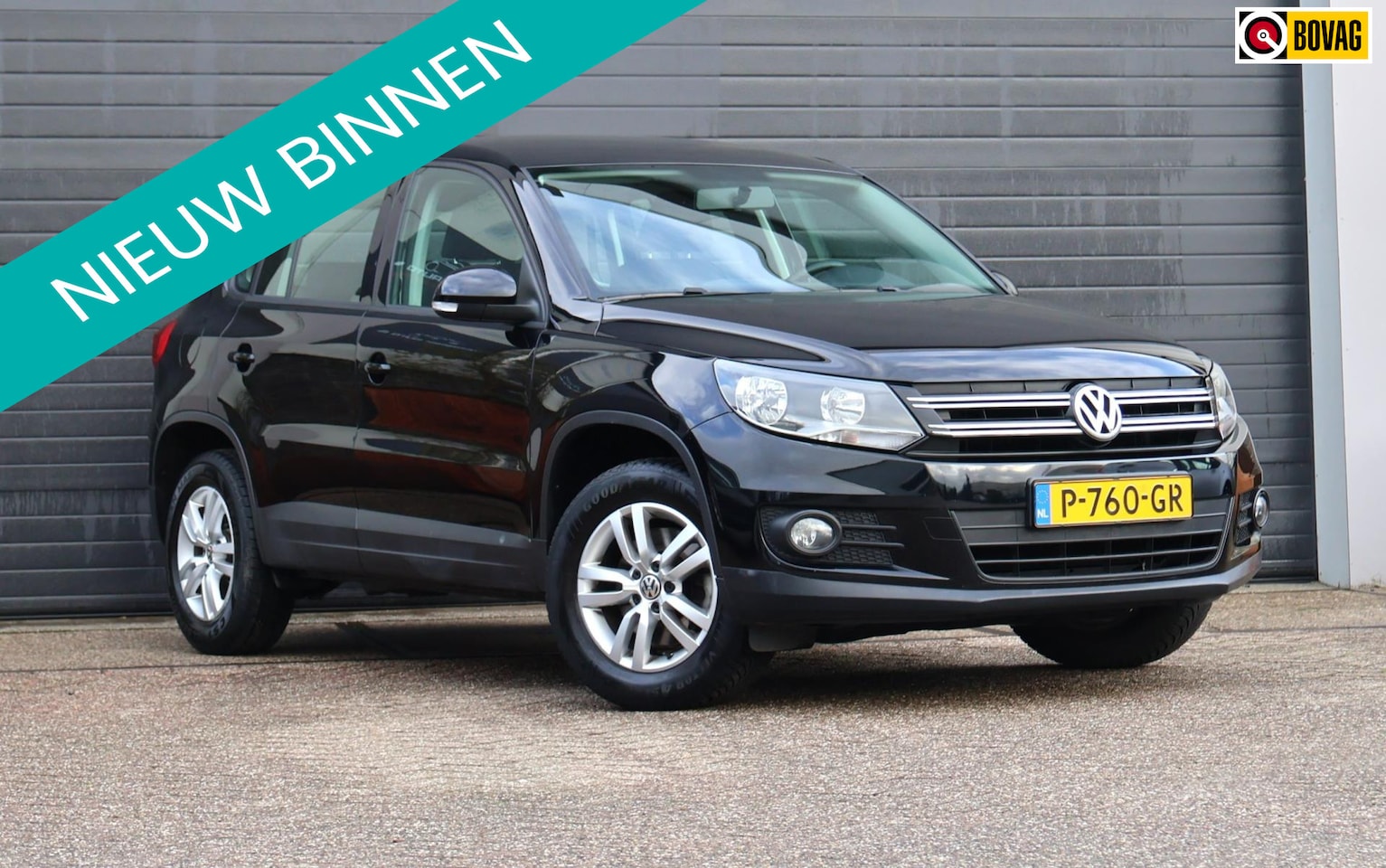 Volkswagen Tiguan - 1.4 TSI Sport&Style Clima/PDC/Navi/Netjes/Trekhaak - AutoWereld.nl