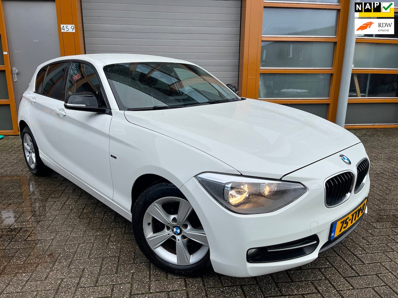 BMW 1-serie - 116i Business+|Airco|Cruise|Bluetooth|Automaat| - AutoWereld.nl