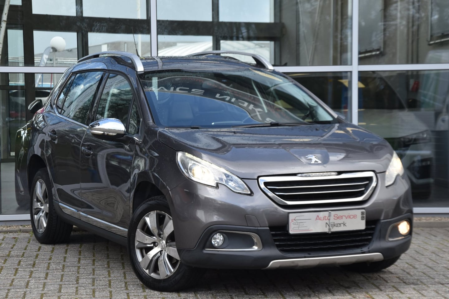 Peugeot 2008 - 1.6 e-HDi Allure Airco Elek. Ramen Pdc Trekhaak Lm-Velgen - AutoWereld.nl