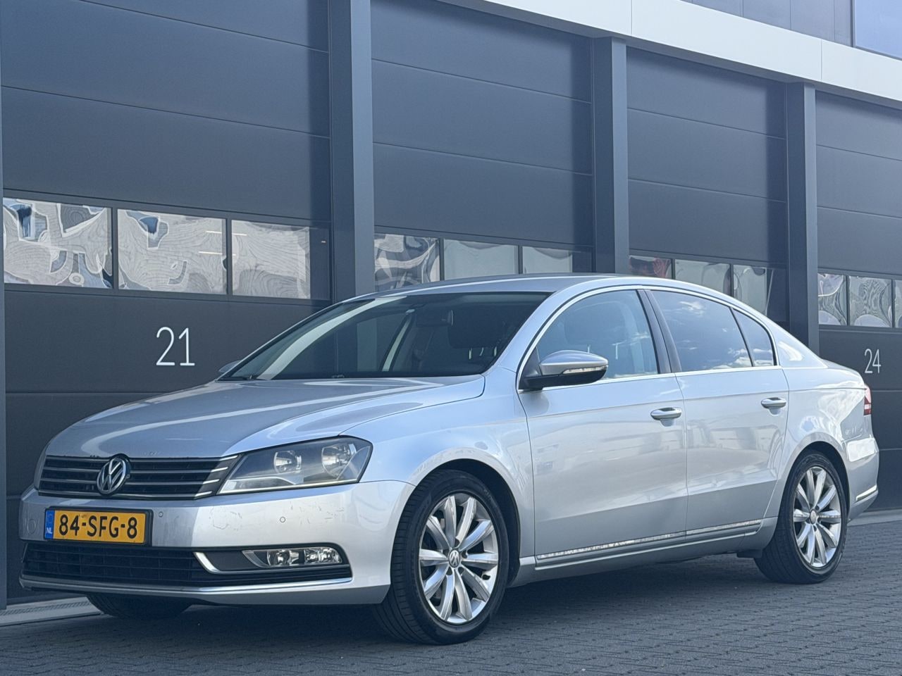Volkswagen Passat - 1.6 TDI BlueMotion Navi PDC - AutoWereld.nl