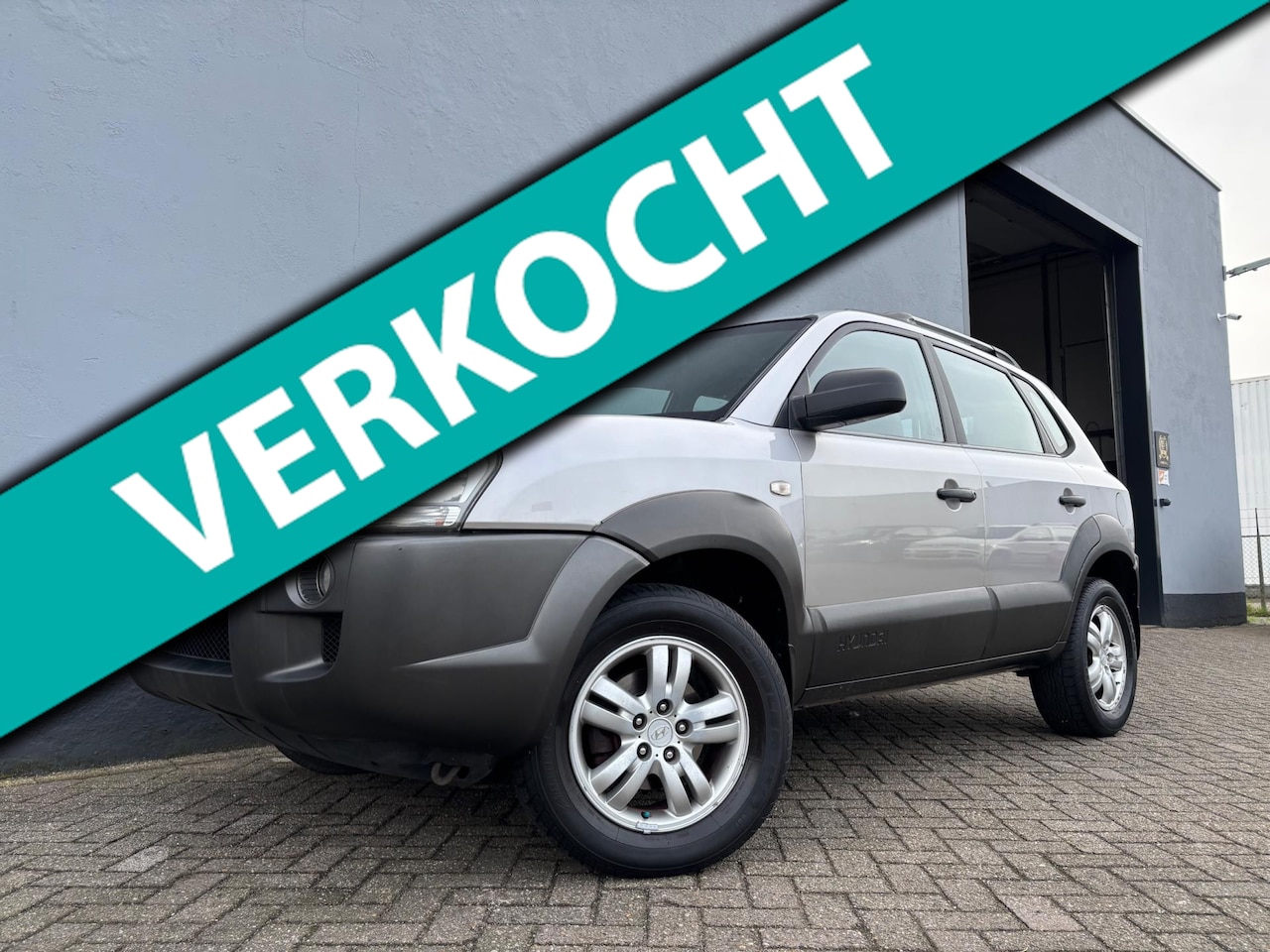 Hyundai Tucson - 2.0i Active - Airco - AutoWereld.nl
