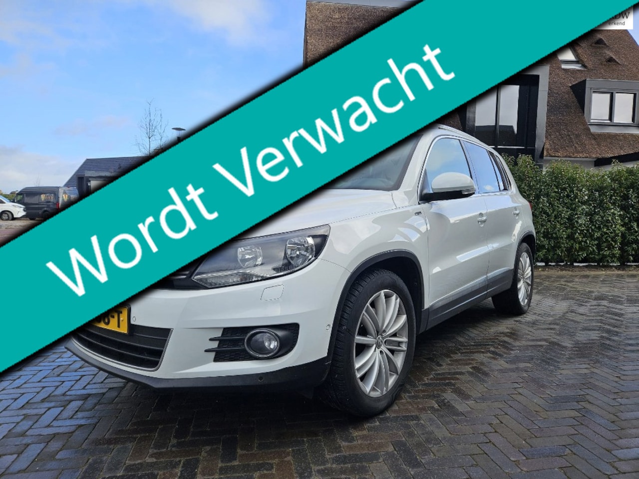 Volkswagen Tiguan - 1.4 TSI R-Line 122pk 2e eig. Clima Navi PDC Pano Xenon - AutoWereld.nl
