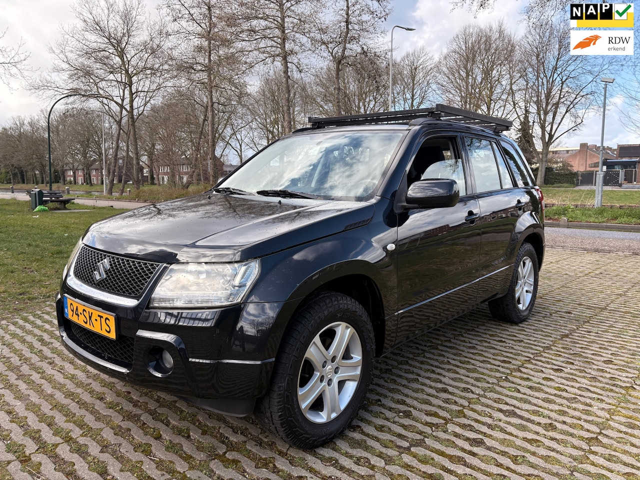 Suzuki Grand Vitara - 2.0-16V Exclusive - 4 x 4 - airco - cruise control - AutoWereld.nl