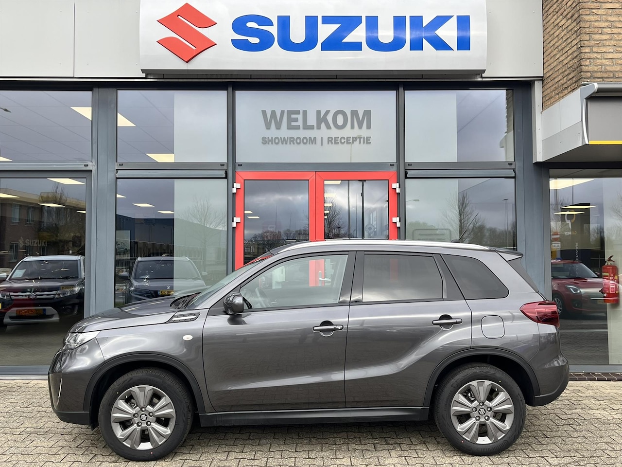 Suzuki Vitara - 1.4 129pk Smart Hybrid Select (RIJKLAARPRIJS) Tot 10 jaar Suzuki Garantie* - AutoWereld.nl