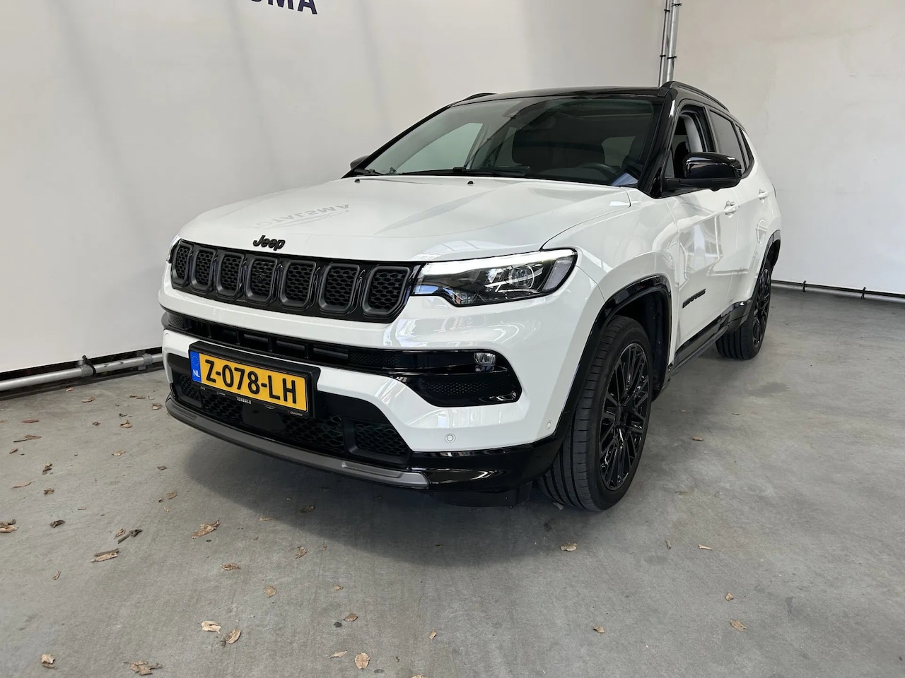 Jeep Compass - 1.5T e-Hybrid S | Schuif / kantel dak | Two tone | Leder | Alpine | LED | - AutoWereld.nl