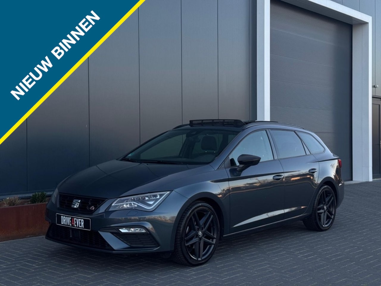SEAT Leon Sportstourer - 1.5 TSI FR Bns Int. VIRTAUL PANO CAMERA LEDER LED SPORTVELGEN - AutoWereld.nl