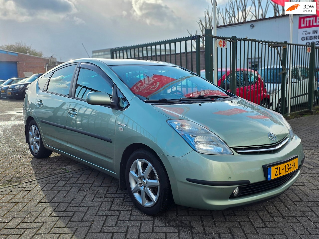 Toyota Prius - 1.5 VVT-i 2e eigenaar volledig dealer onderhouden achteruit camera stoelverwarming cruis c - AutoWereld.nl