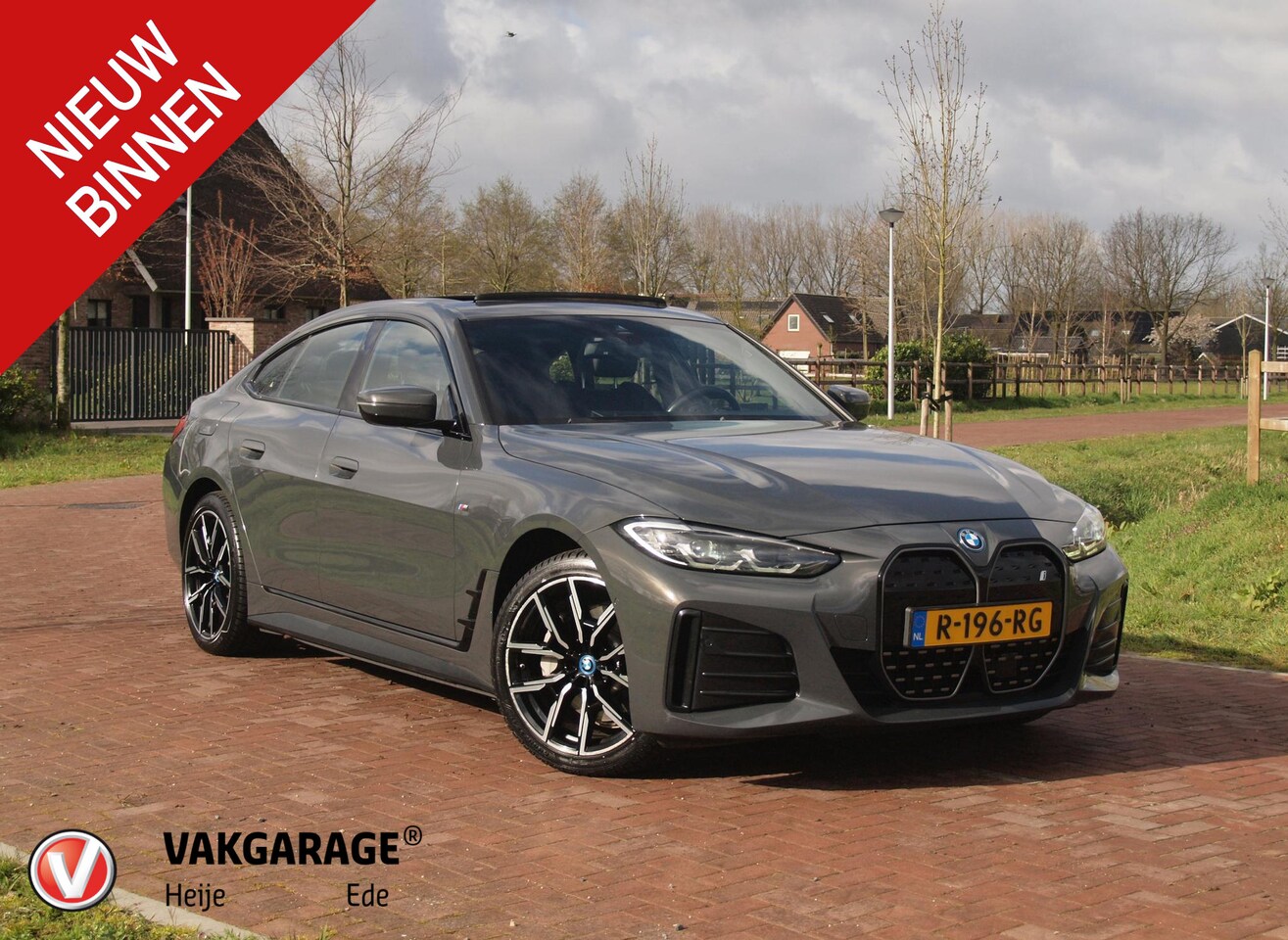 BMW i4 - eDrive40 84 kWh | M-Pakket | Schuifdak | Camera | Dravitgrau metallic | NL-Auto | - AutoWereld.nl